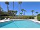 Enjoy the community pool with lots of sun and palm trees right outside your door at 2675 Gulf Of Mexico Dr # 301, Longboat Key, FL 34228