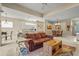 Open concept floor plan with a living room, dining area, and breakfast bar at 28 Tall Trees Ct, Sarasota, FL 34232