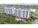 Aerial view of condo buildings, pond, and outdoor pool at 2825 Terra Ceia Bay Blvd # 1505, Palmetto, FL 34221