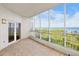This condo features a balcony with tile floors and expansive windows overlooking the water at 2825 Terra Ceia Bay Blvd # 1505, Palmetto, FL 34221
