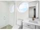 Bathroom with glass enclosed shower and custom mirror at 2825 Terra Ceia Bay Blvd # 1505, Palmetto, FL 34221