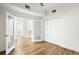 Bedroom featuring hardwood floors with adjacent closet and bathroom at 2825 Terra Ceia Bay Blvd # 1505, Palmetto, FL 34221