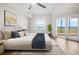 Bright main bedroom with hardwood floors, king bed and an adjoining balcony with water views at 2825 Terra Ceia Bay Blvd # 1505, Palmetto, FL 34221