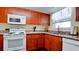 Bright kitchen features updated countertops and appliances at 4200 Gulf Dr # 101, Holmes Beach, FL 34217