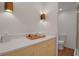 Modern bathroom featuring a sleek vanity, contemporary lighting, and a glass-enclosed shower at 4234 Gulf Of Mexico Dr # H2, Longboat Key, FL 34228