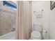 Cozy bathroom featuring a shower-tub combo and a modern toilet at 4477 White Cedar Trl, Sarasota, FL 34238