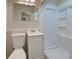 This bathroom includes a single sink vanity, a toilet, and a bright white shower stall at 470 Leach St, Englewood, FL 34223