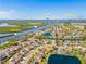 Incredible aerial view of home near Gulf, Braden River, and local amenities, featuring lush landscaping, and serene water views at 4809 11Th Avenue E Cir, Bradenton, FL 34208