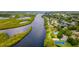Gorgeous aerial view of the Braden River Lakes neighborhood with lush landscaping and water views at 4809 11Th Avenue E Cir, Bradenton, FL 34208