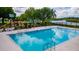 Enjoy the community pool with lounge chairs, a playground, and views of the lake at 4809 11Th Avenue E Cir, Bradenton, FL 34208