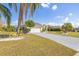 Charming single-story home with a well-manicured lawn and a two-car garage at 4809 11Th Avenue E Cir, Bradenton, FL 34208