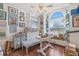 Bright home office with arched window, lots of storage, and wood floors at 4809 11Th Avenue E Cir, Bradenton, FL 34208