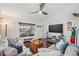 Spacious living room boasts modern decor, sleek hardwood floors and large windows with lots of natural light at 4809 11Th Avenue E Cir, Bradenton, FL 34208
