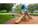 Community playground with slides, swings, and picnic area near the water, perfect for Gathering fun at 4809 11Th Avenue E Cir, Bradenton, FL 34208