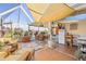 Spacious sunroom featuring wicker furniture and a relaxed atmosphere, perfect for enjoying the outdoors indoors at 4809 11Th Avenue E Cir, Bradenton, FL 34208