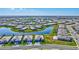 Expansive aerial showcasing a community with beautiful water views and well-maintained homes at 4968 Seafoam Trl, Bradenton, FL 34211