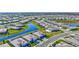 Stunning aerial of a lakeside residential community featuring well-manicured lawns and modern homes at 4968 Seafoam Trl, Bradenton, FL 34211