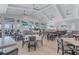 Bright community dining space with ample seating, clean lines, and neutral color palette at 4968 Seafoam Trl, Bradenton, FL 34211