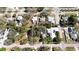 Aerial view showcasing property lines, lush tree coverage, and neighborhood layout at 617 35Th W St, Bradenton, FL 34205