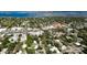 Aerial view of neighborhood highlighting property location near shops and waterway at 617 35Th W St, Bradenton, FL 34205
