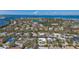 Waterfront property nestled among lush foliage, showcasing the stunning coastal community and tranquil waterways at 619 Buttonwood Dr, Longboat Key, FL 34228