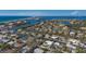 Waterfront property nestled among lush foliage, showcasing the stunning coastal community and tranquil waterways at 619 Buttonwood Dr, Longboat Key, FL 34228
