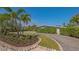 Pristine landscaping complements the home's modern exterior, creating a peaceful, inviting setting at 619 Buttonwood Dr, Longboat Key, FL 34228