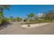 Charming modern house with an elegant driveway and lush tropical landscaping in a serene setting at 619 Buttonwood Dr, Longboat Key, FL 34228