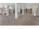 The lower level features painted support columns, a gravel floor, and wooden latticework at 650 Penfield St, Longboat Key, FL 34228