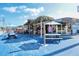 Fun outdoor seating and bar area with a tiki hut themed design at 710 Birdsong Ln, Sarasota, FL 34242