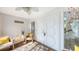 Foyer with double doors and a welcome sign to greet visitors at 710 Birdsong Ln, Sarasota, FL 34242