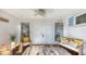 Foyer featuring tile floors, a ceiling fan, and comfortable seating at 710 Birdsong Ln, Sarasota, FL 34242