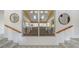 View of living room from the foyer with stairway at 710 Birdsong Ln, Sarasota, FL 34242