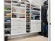 Well-organized closet featuring shelving, drawers, and hanging space for efficient storage of clothes, shoes, and accessories at 8271 Redonda Loop, Lakewood Ranch, FL 34202