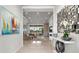 Bright foyer with polished tile floors and views of the spacious living area at 8271 Redonda Loop, Lakewood Ranch, FL 34202