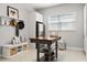 Laundry room with stainless steel refrigerator and ample storage at 8271 Redonda Loop, Lakewood Ranch, FL 34202