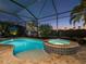 Heated pool and spa combination, perfect for evening swims and relaxation at 8271 Redonda Loop, Bradenton, FL 34202