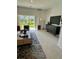 Bright living room with a modern decor and a view of the outdoors at 8949 Daybreak St, Sarasota, FL 34241