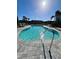Enjoy this community pool with plenty of lounge chairs and beautiful landscaping to sit back and relax at 8949 Daybreak St, Sarasota, FL 34241