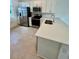 Well-lit kitchen featuring modern appliances and counter space at 8949 Daybreak St, Sarasota, FL 34241