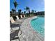 Inviting community pool features several sun loungers for residents to enjoy relaxing by the crystal clear water at 8949 Daybreak St, Sarasota, FL 34241