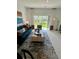 Comfortable living room with large windows and stylish decor at 8949 Daybreak St, Sarasota, FL 34241