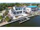 Waterfront home with a dock, boat lift, and pool under construction at 927 Contento St, Sarasota, FL 34242