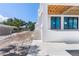New backyard with a large patio, staircase and outdoor kitchen at 927 Contento St, Sarasota, FL 34242