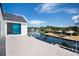 Balcony with views of the canal and the surrounding neighborhood, and neighborhood docks at 927 Contento St, Sarasota, FL 34242