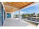Covered balcony with view of the canal, and an unfinished pool at 927 Contento St, Sarasota, FL 34242