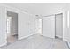 Bedroom featuring an open doorway, closet, and neutral walls at 927 Contento St, Sarasota, FL 34242
