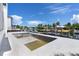 Unfinished pool with modern tile floors overlooking a canal at 927 Contento St, Sarasota, FL 34242