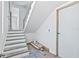 Wooden staircase leading to the upper level, offering a design ready to customize at 927 Contento St, Sarasota, FL 34242