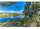 Scenic pond view showcases the peaceful surroundings and neighborhood at 11744 Shirburn Cir, Parrish, FL 34219